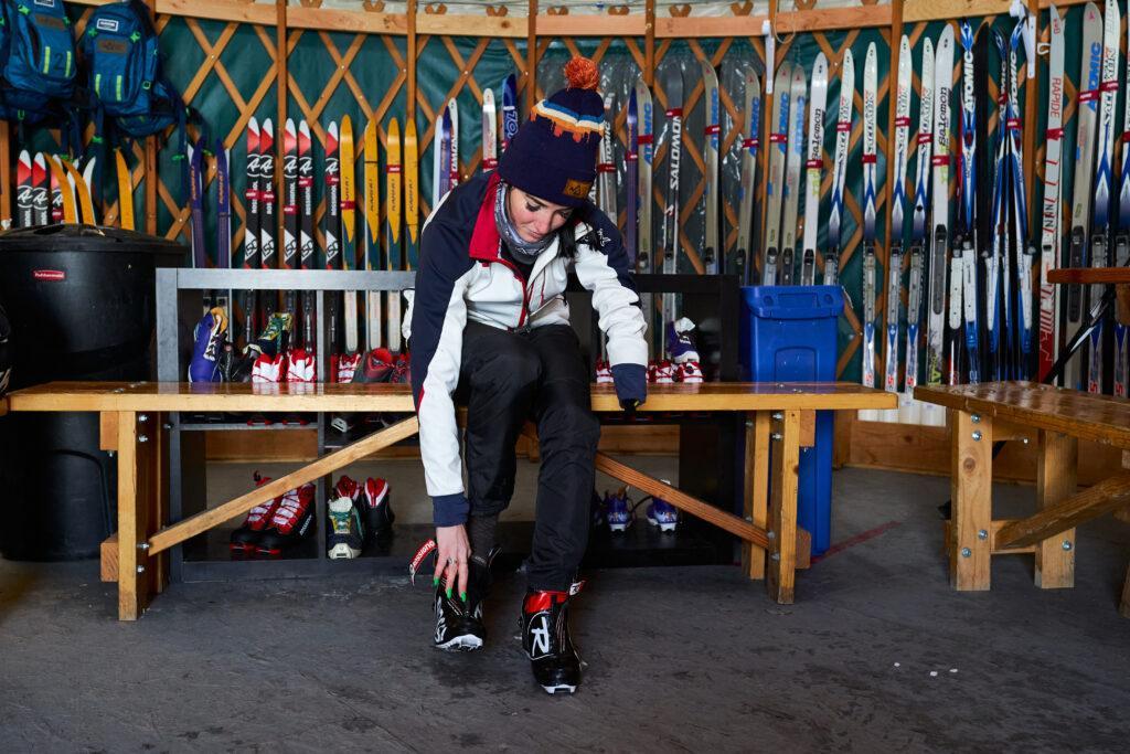 Paralympic Hopeful, Dani putting on cross country ski boots