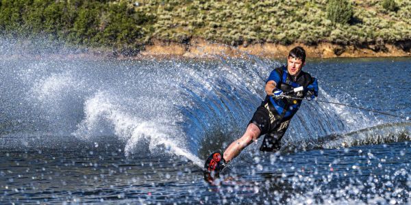 A man with one arm and one leg water skis on the Jordanelle in Park City, Utah.